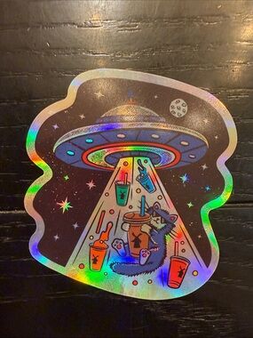Dutch Bros Holographic UFO Cat Sticker — Rainbow Accents on Black